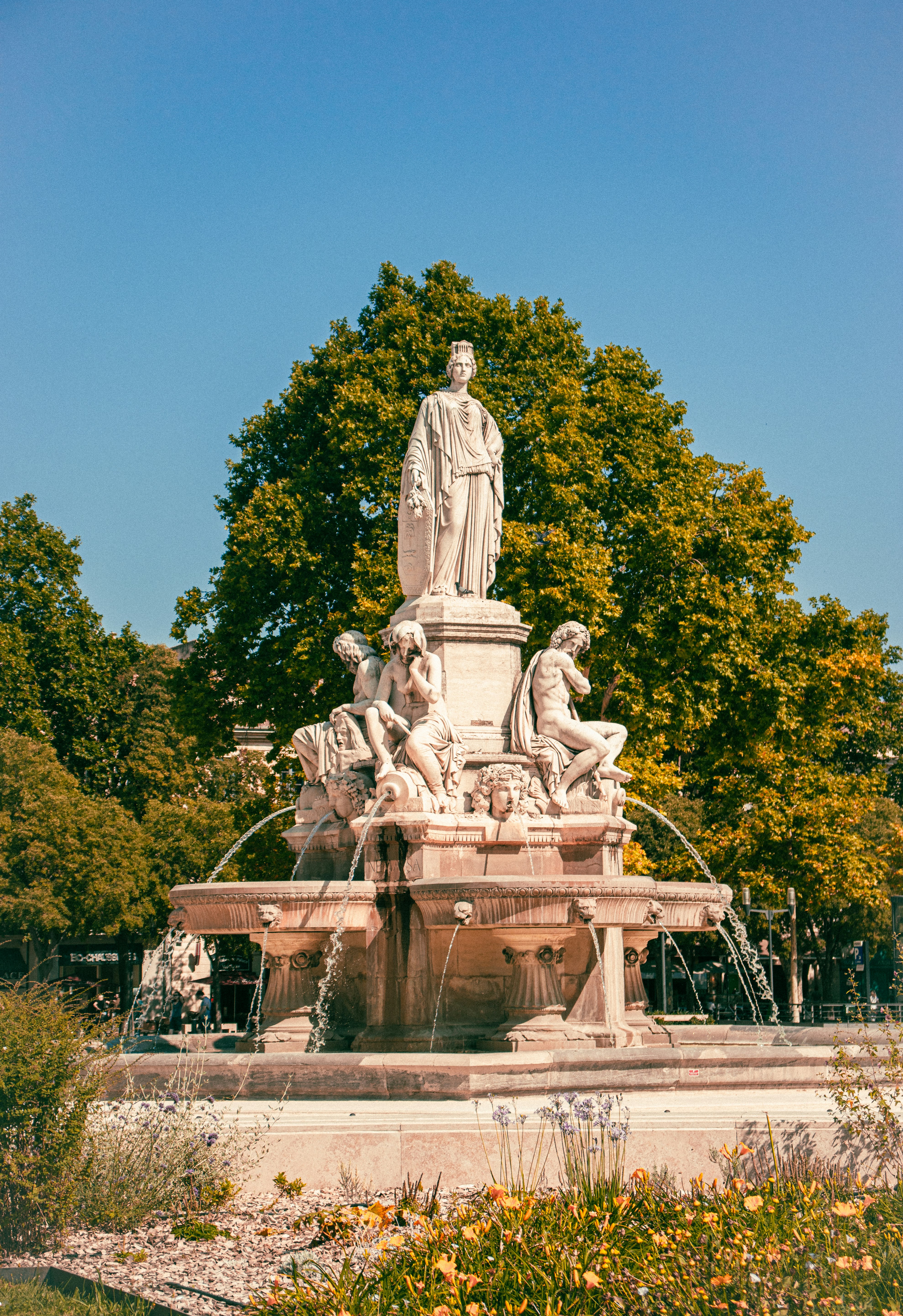 gray concrete statue of man and woman